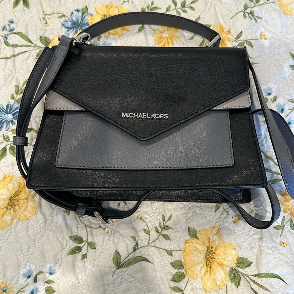 Michael Kors over body or clutch bag used only once or twice